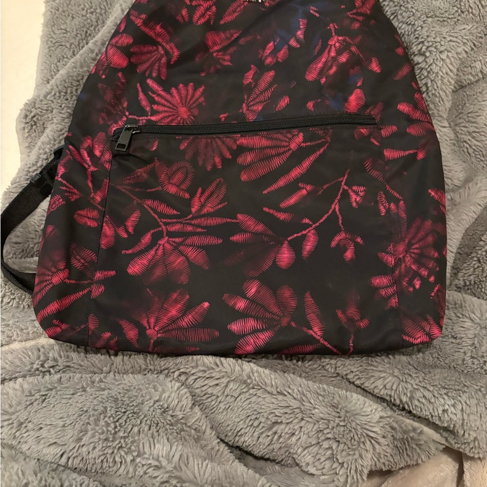 Tumi Black and Pink Floral Backpack